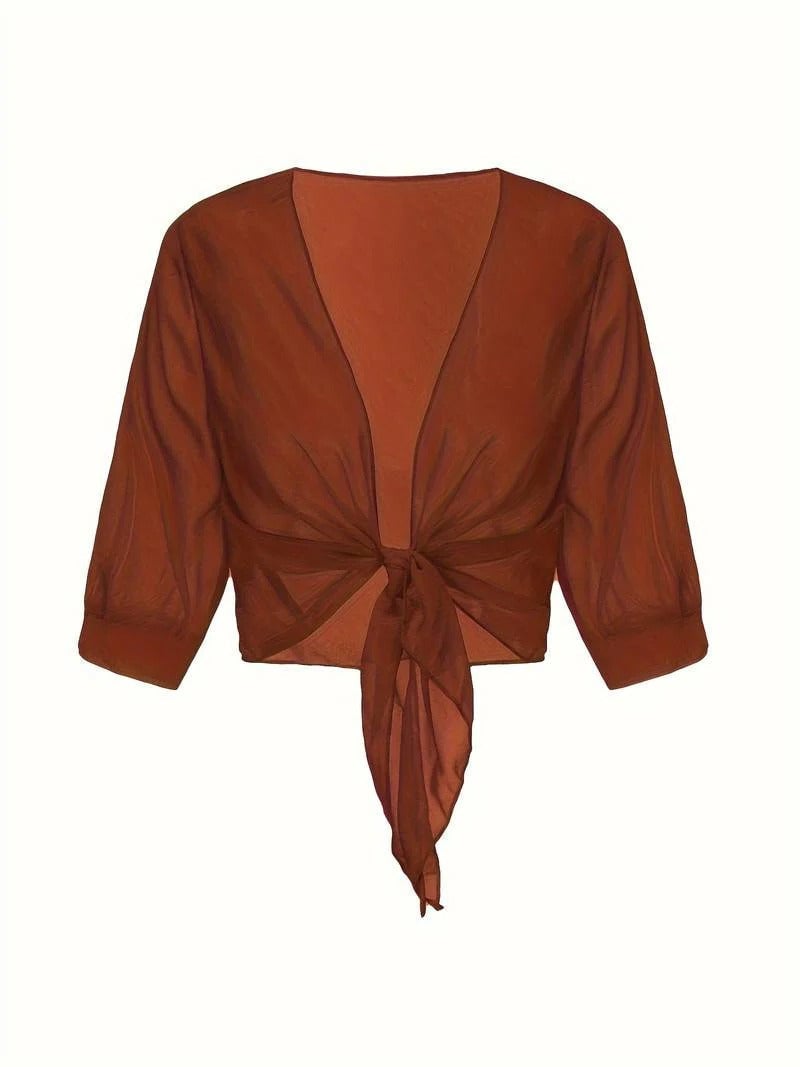 Woman in the Brisa lightweight sheer blouse in caramel with 3/4 sleeves