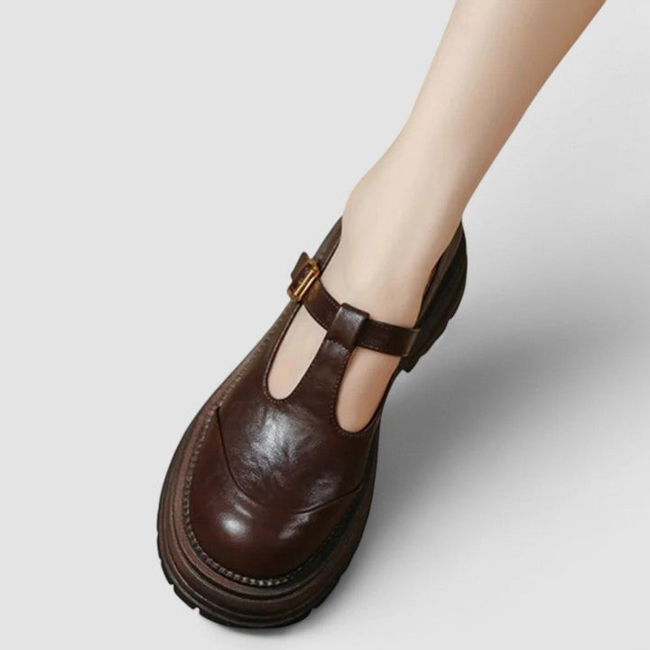 Insole detail of orthopedic mary jane shoe showing cushioned arch support lining
