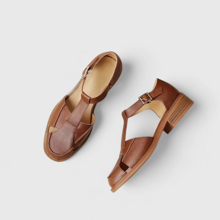 Close-up of the adjustable Mary Jane strap on the Brooke sandal in beige