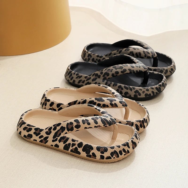 Brooke sandal in Black/White colorway, side profile showing contoured footbed