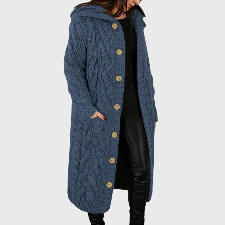 Woman wearing the Cadence elegant cozy coat in a soft structured silhouette, styled for a polished everyday look