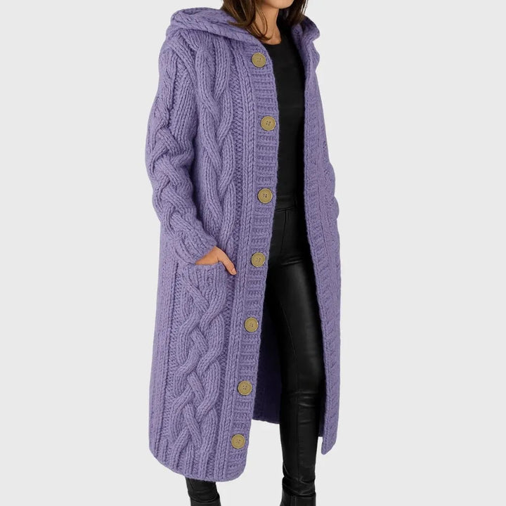 Cadence cozy coat in blue colorway laid flat to showcase the full length and sleeve detail
