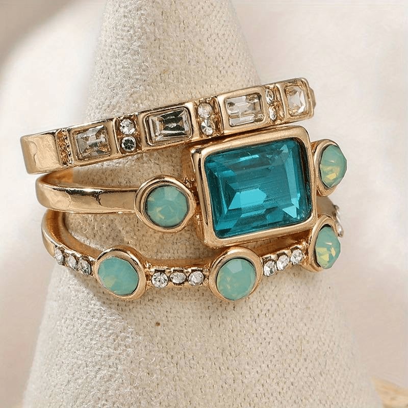 Vintage blue crystal ring shown from a second angle highlighting the band and stone setting