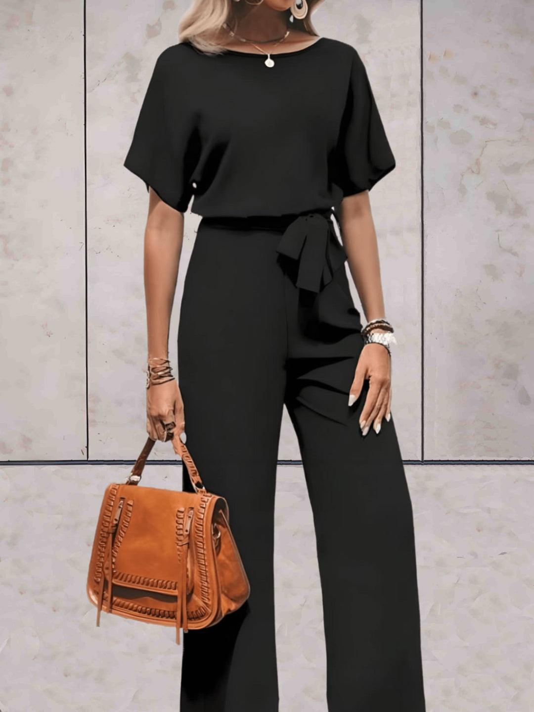 Full-length shot of the Cali set in green showing the wide-leg trouser length and coordinated fit