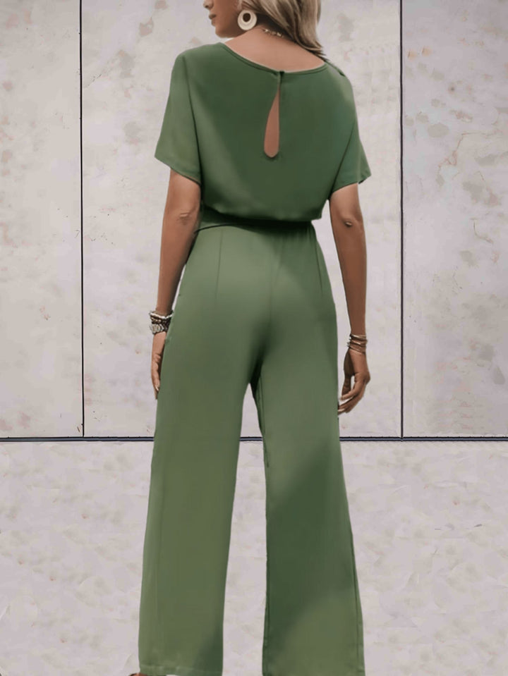 Flat lay of the Cali short-sleeve top and wide-leg pants in all three colors: black, beige, and green