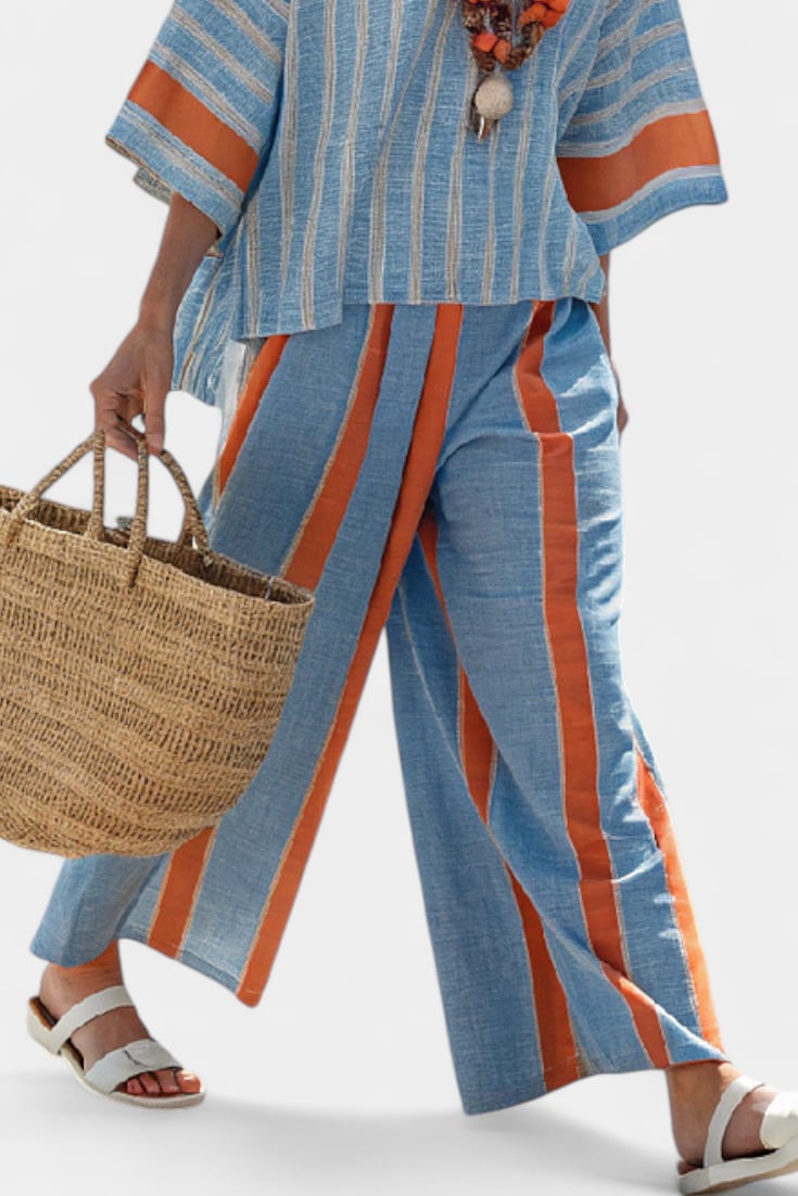 Full-length back view of the Calista striped linen two-piece set with wide-leg pants, styled with sandals