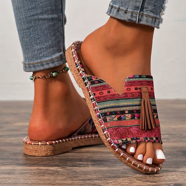Rear view of Calla women's flat sandals showing heel support and strap closure