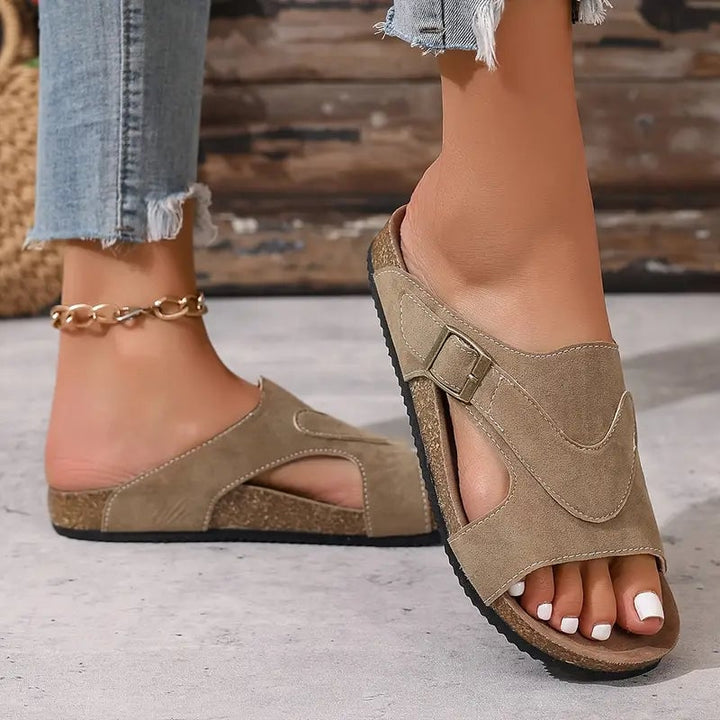 Calliope flat sandal in beige, front three-quarter view