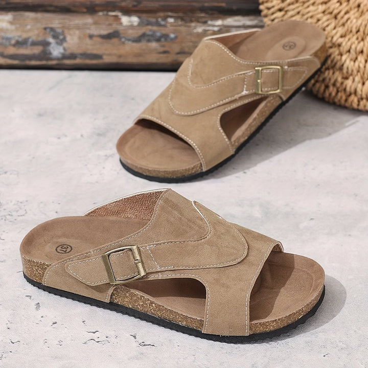 Calliope flat sandal in beige, back heel view