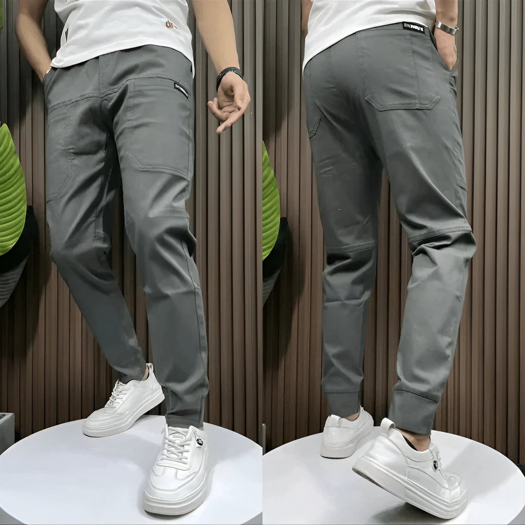 Side view of women's stretch cargo pants showing pocket detail and slim modern silhouette
