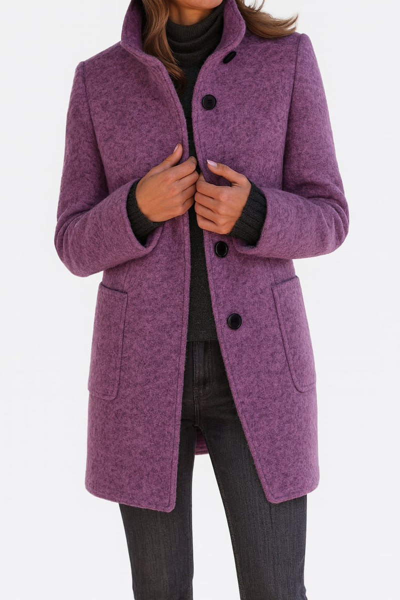 Side profile of the Camila coat highlighting its clean, graceful silhouette