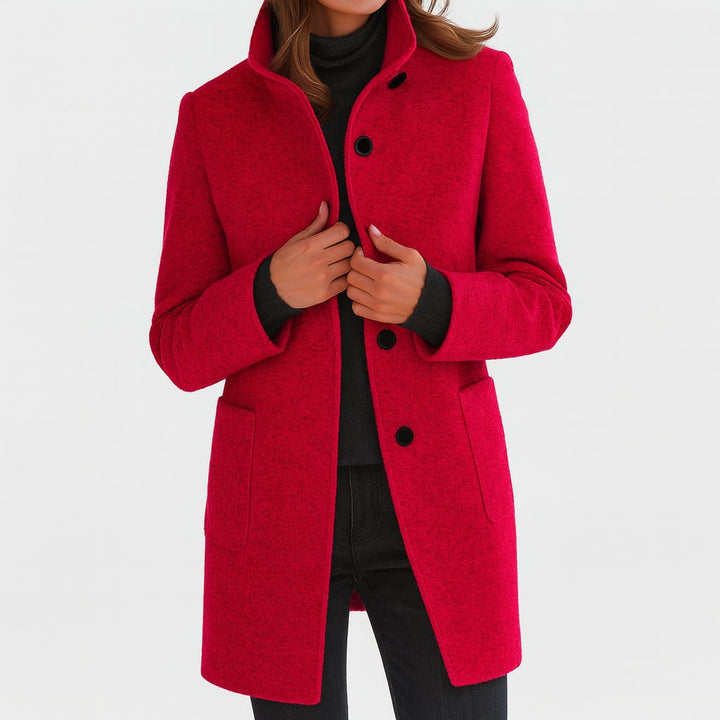 Woman in the Camila coat paired with trousers for a smart workwear look