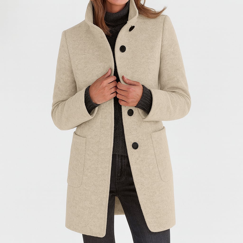 Camila coat in black colorway, showcasing its versatile, timeless design