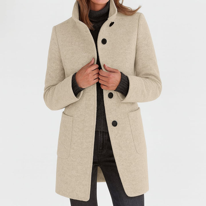 Camila coat in black colorway, showcasing its versatile, timeless design