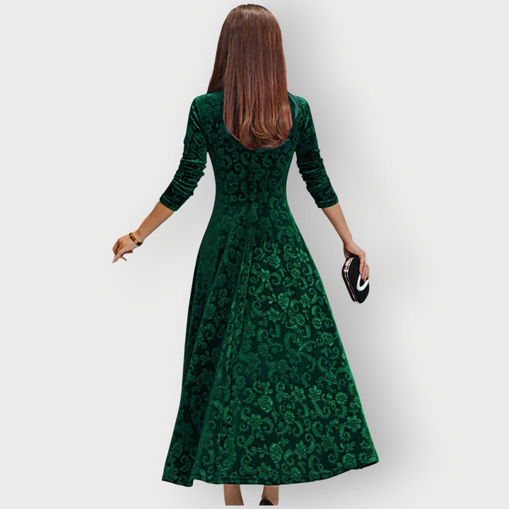 Overhead lifestyle flat lay of the Camila velvet midi dress in multiple color options