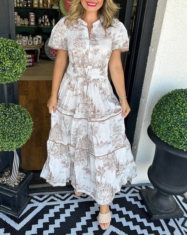 Front view of the Camille Classic Toile Maxi Dress in green toile print with smocked waist and tiered skirt
