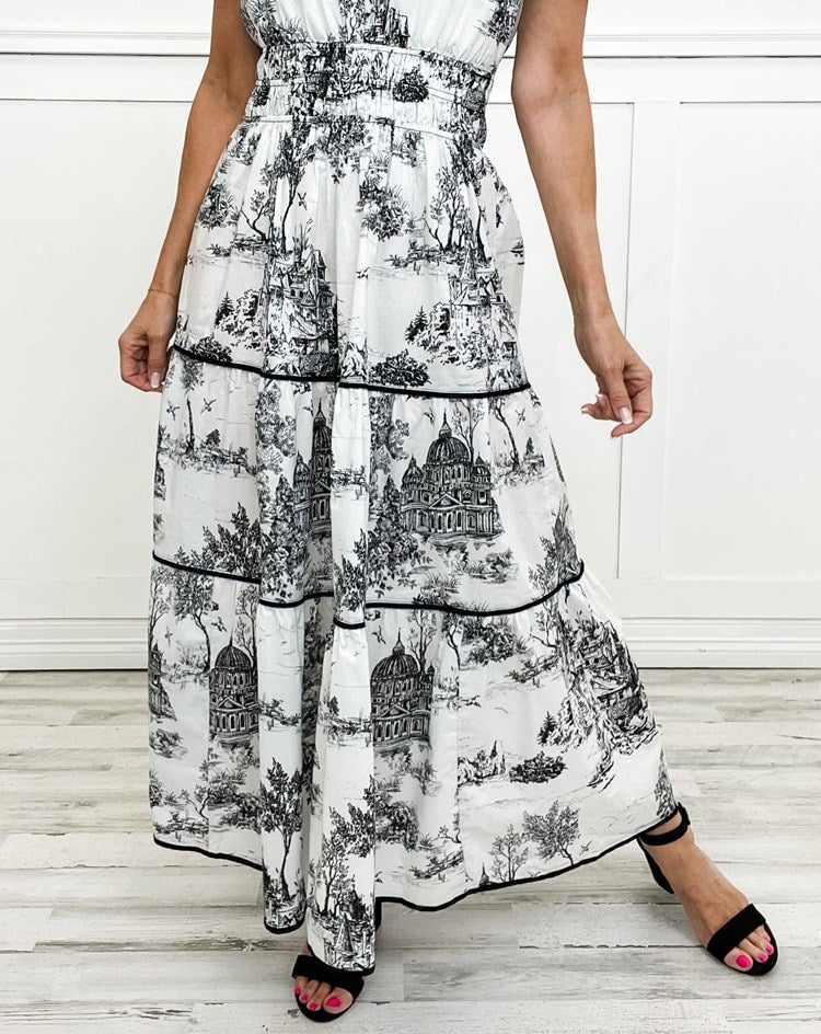 Flat lay of the Camille Classic Toile Maxi Dress in green showing the all-over toile print