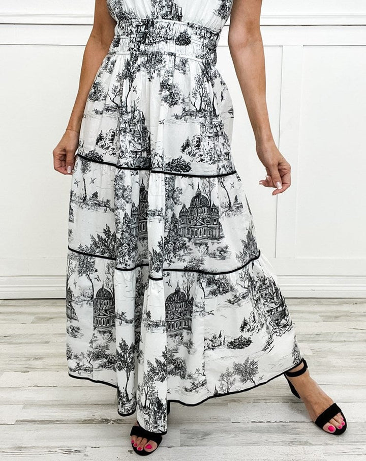 Flat lay of the Camille Classic Toile Maxi Dress in green showing the all-over toile print