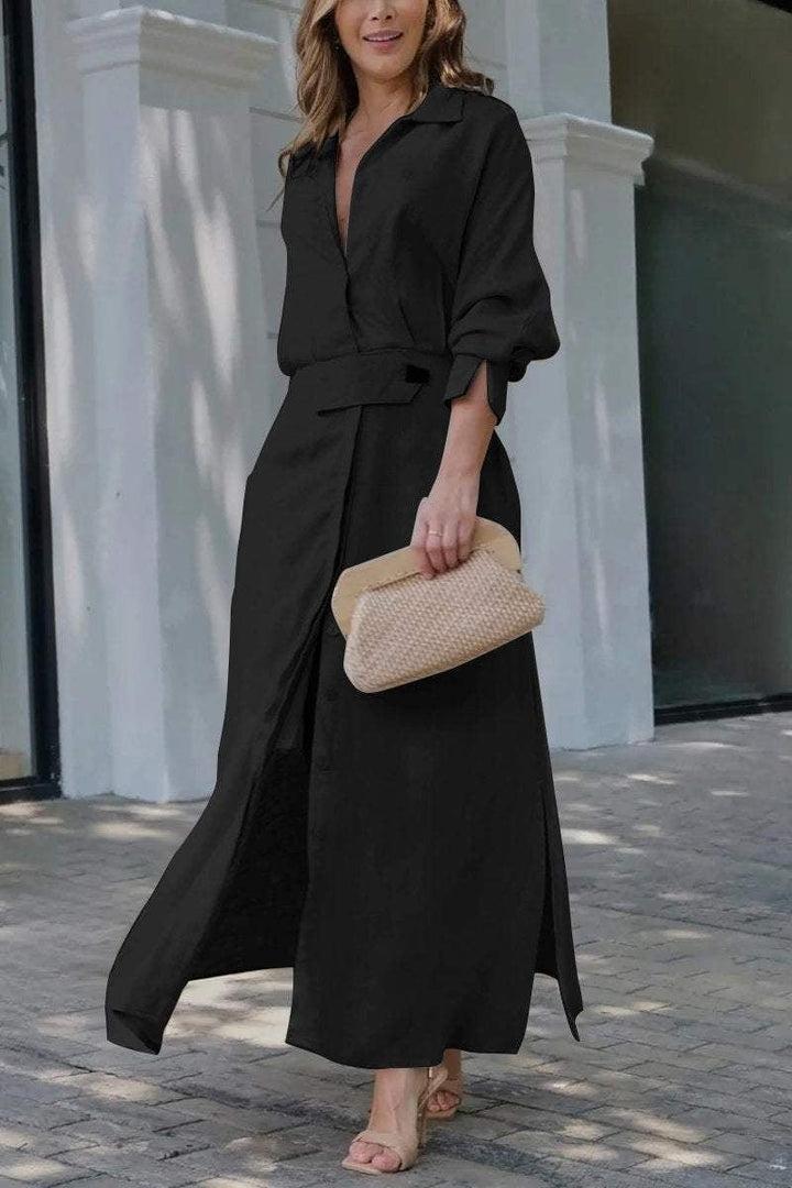 Woman styled in the Camille maxi dress in blue, paired with sandals for a summer daytime look