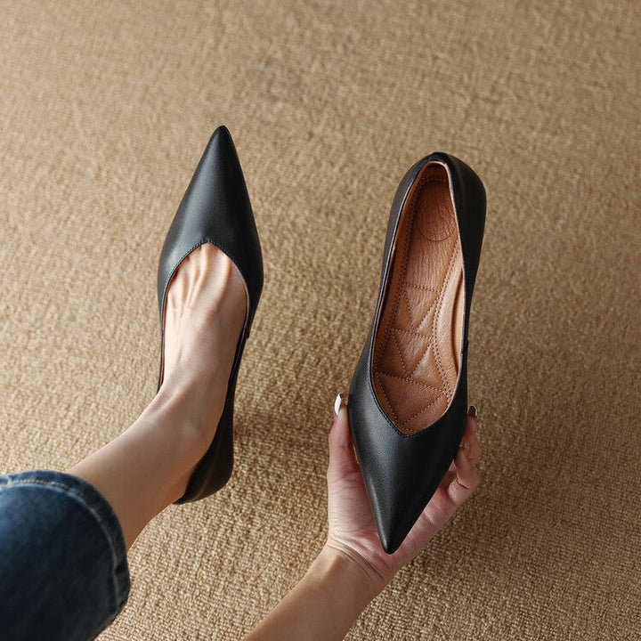 Camille beige and black pumps side by side, color comparison flat lay