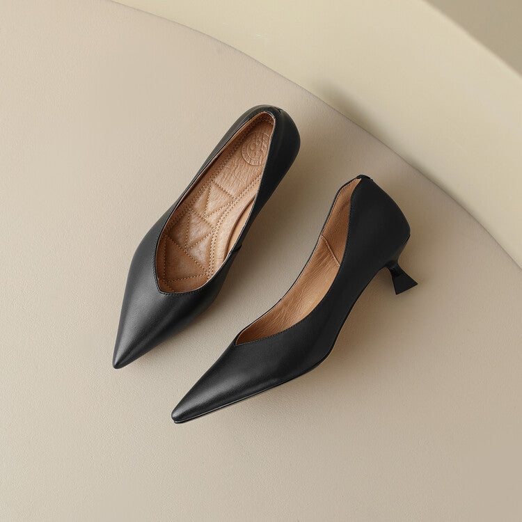 Camille black pump styled with a midi skirt, lifestyle shot