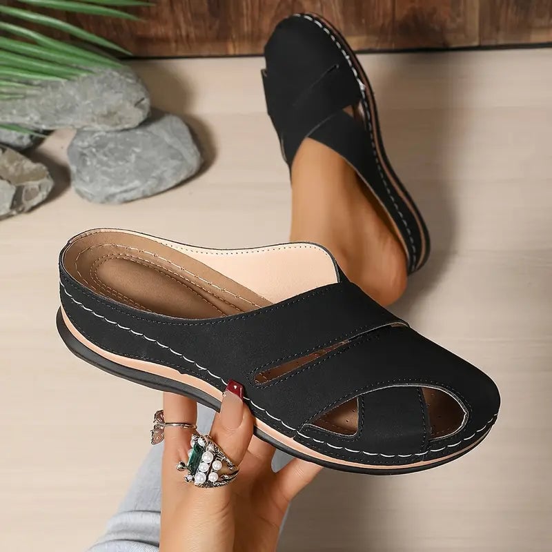 Campbell women's sandals in black with open breathable design and rounded toe, front view