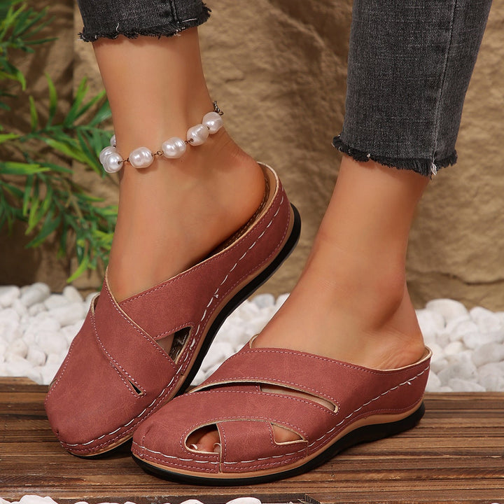 Campbell women's sandals in pink showing strap and sole construction, angled view