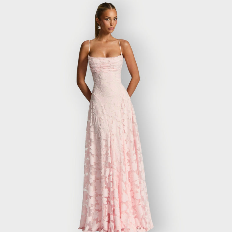 Close-up of the rich velvet fabric texture on the strapless gown in ivory