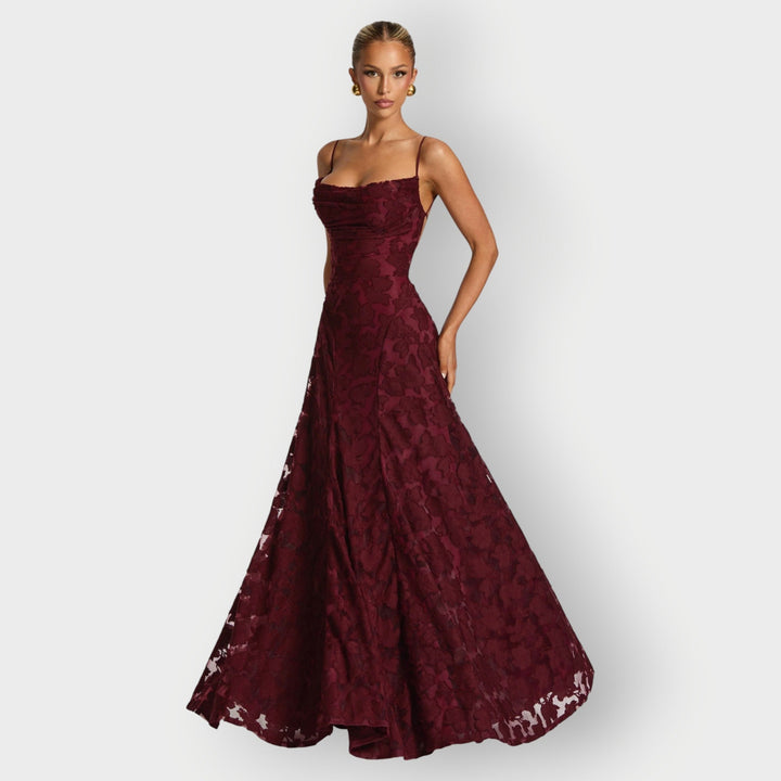 Full-length shot of the ivory strapless velvet gown styled with heels for a formal occasion