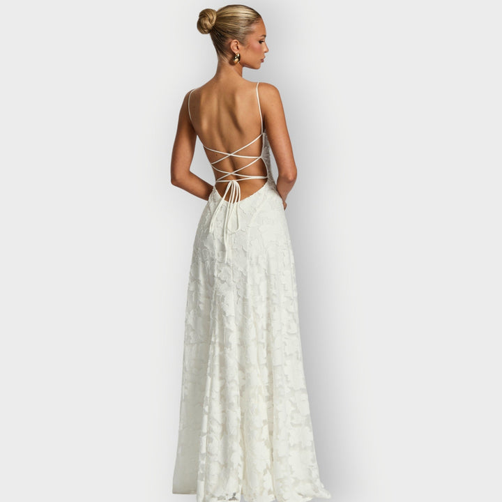 Close-up of the neckline and strapless bodice of the velvet gown in sage green