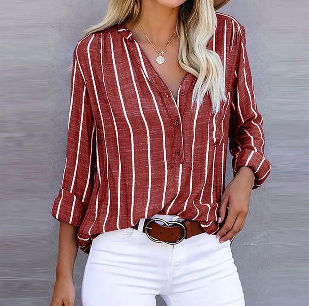Model wearing a red striped casual button-down blouse with roll-up sleeves, relaxed fit, front view