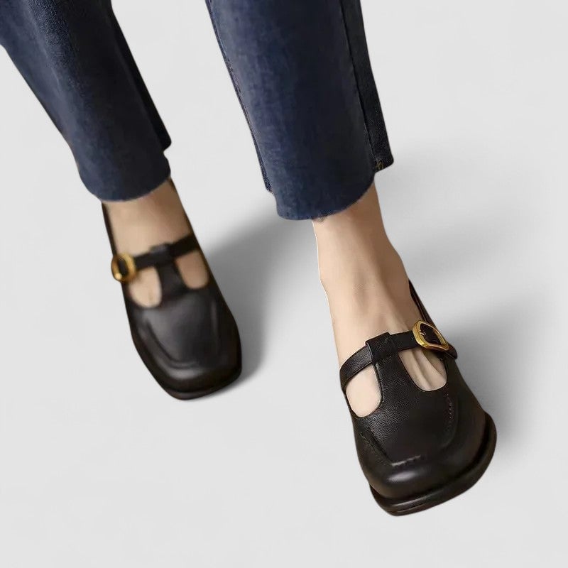 Side profile of brown orthopedic Mary Jane shoes showing the rounded toe and flexible construction