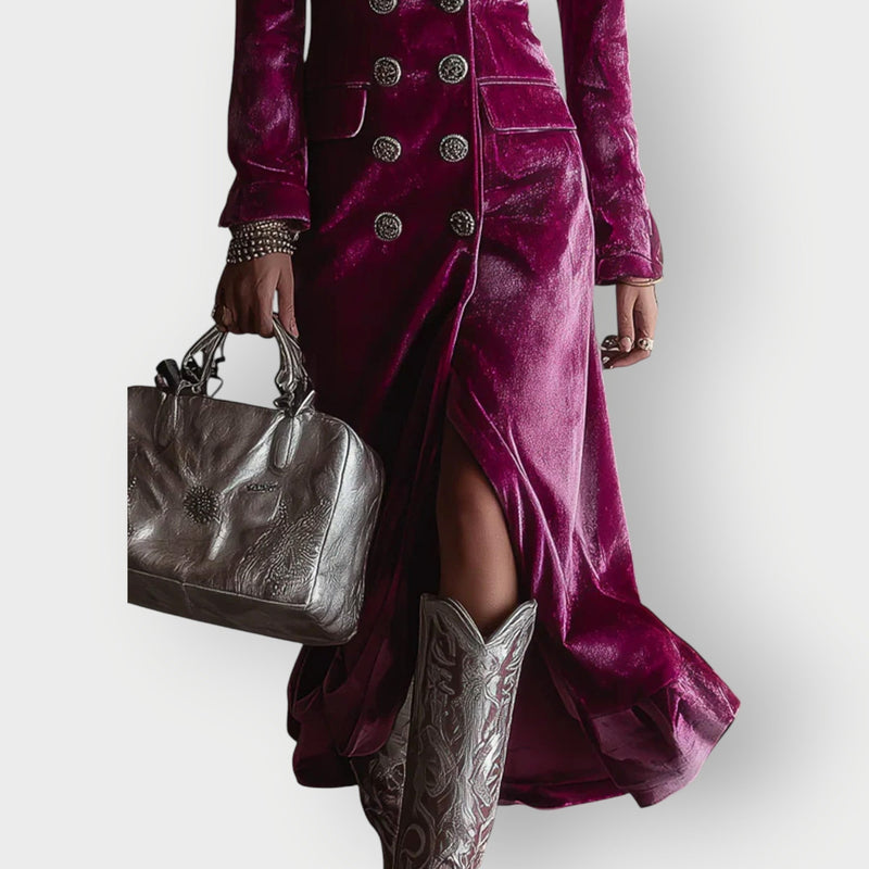 Close-up detail of the plush lilac velvet fabric texture on the maxi dress