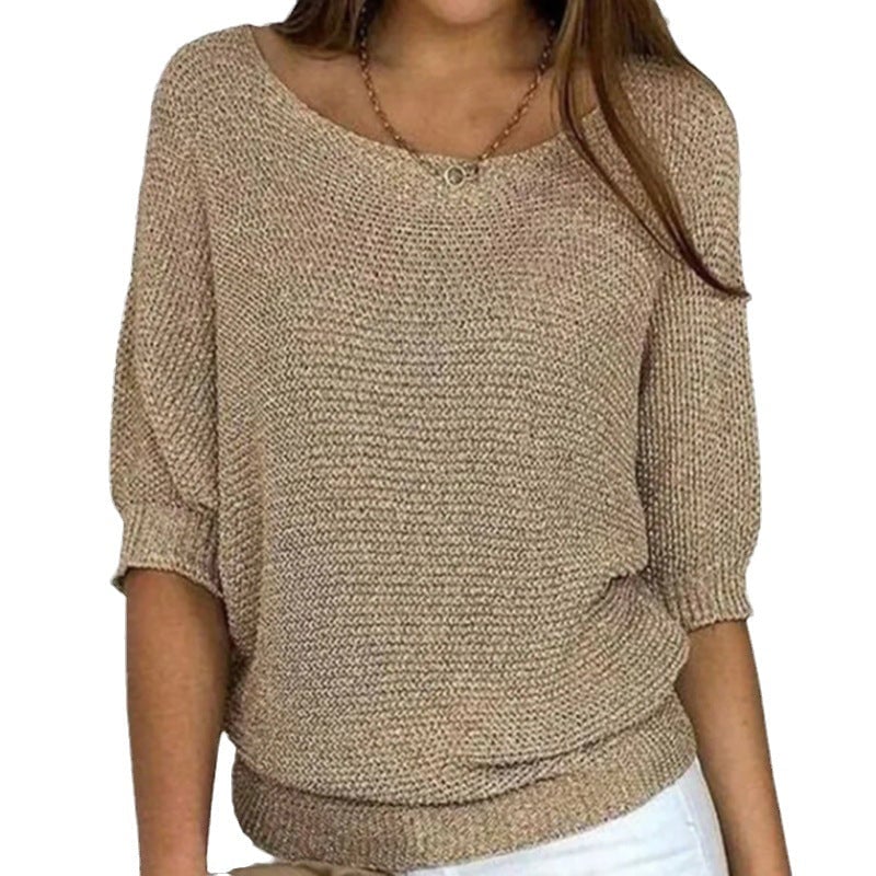 Model wearing the Carla comfort sweater in a relaxed fit, showcasing its soft texture and flattering silhouette
