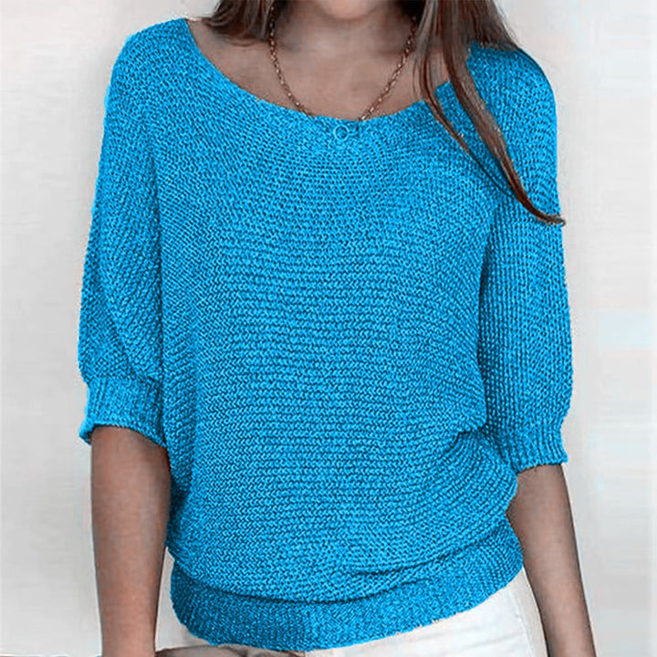 Front view of the Carla comfort sweater styled with high-waisted jeans for a casual everyday look