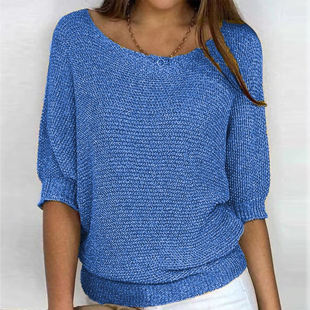 Side profile of model in the Carla comfort sweater demonstrating its elegant, figure-enhancing cut