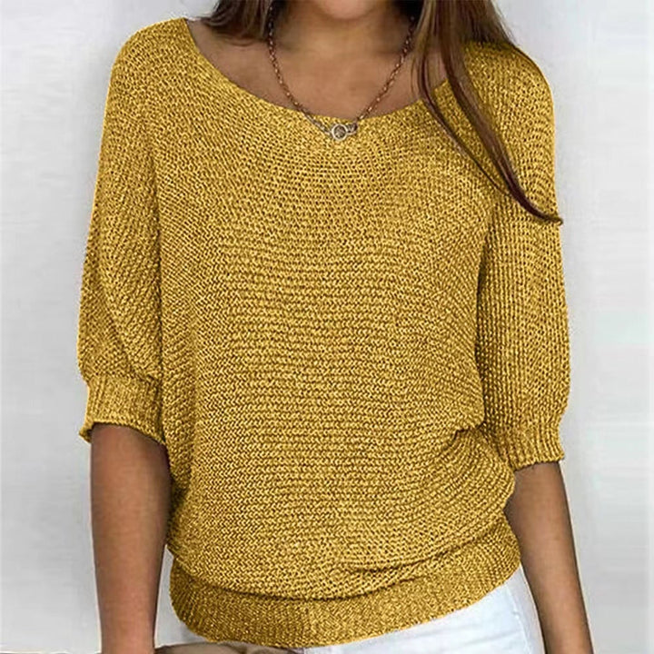 Back view of the Carla comfort sweater highlighting its smooth, seamless finish