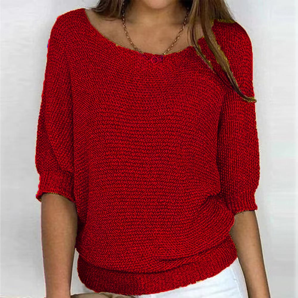 Full-length shot of model in the Carla comfort sweater paired with a midi skirt