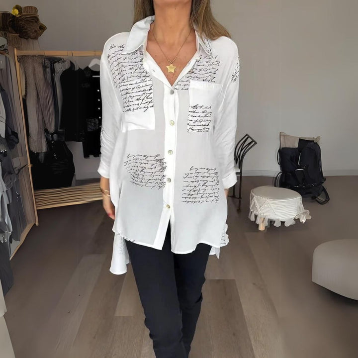 Close-up of the handwritten script print and collar on the Carla button-up shirt