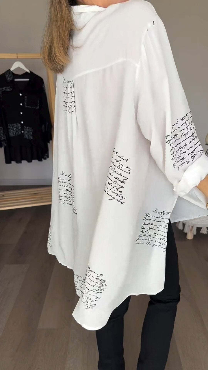 Side view of the Carla handwritten button-up shirt showing relaxed silhouette and hem length