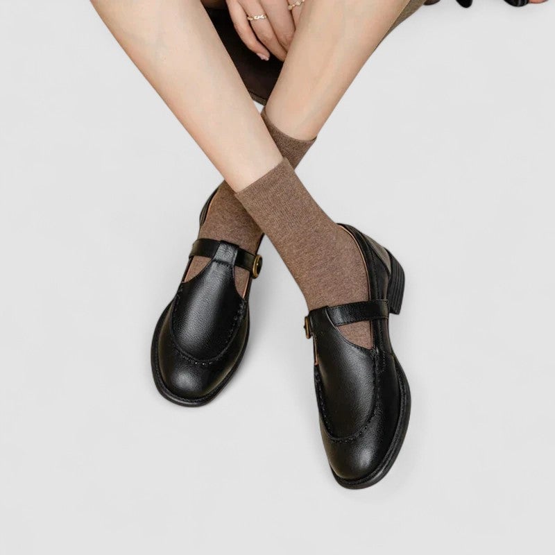 Florimay Carla square-toe Mary Jane shoes in black with T-strap detail, front view on white background