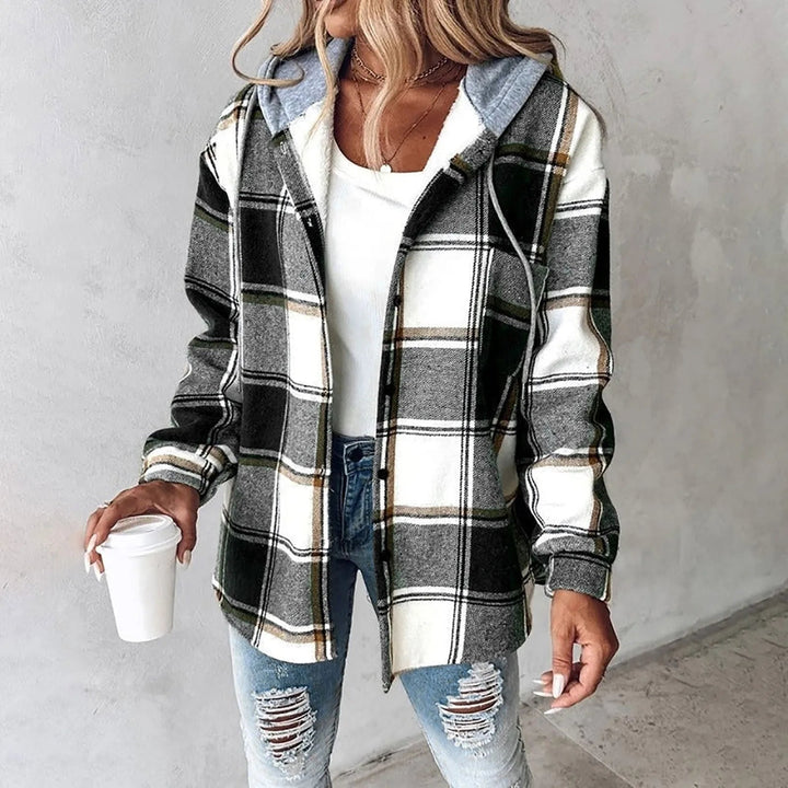 Woman wearing a checkered lined cardigan in a relaxed draped fit, styled for fall