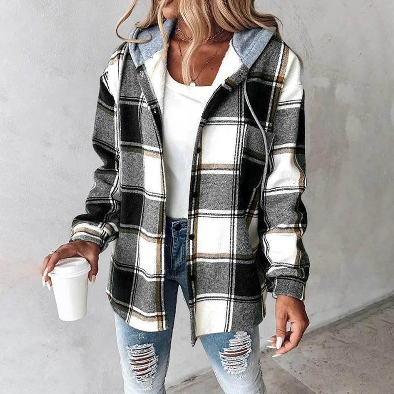 Woman wearing a checkered lined cardigan in a relaxed draped fit, styled for fall