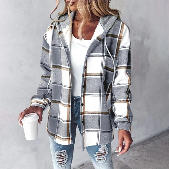 Close-up of checkered pattern detail on a cozy lined women's cardigan