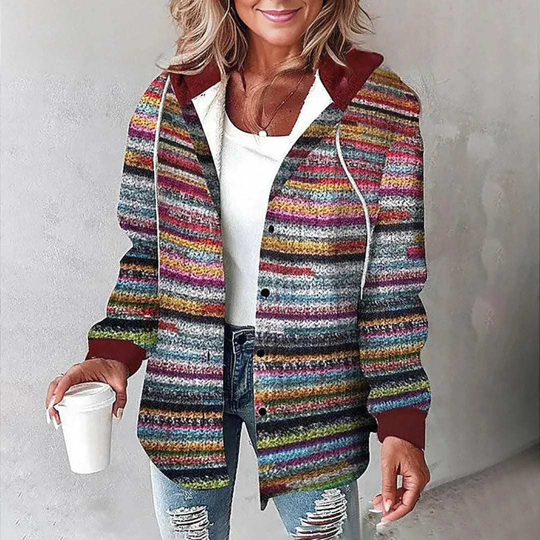 Woman wearing gray checkered lined cardigan paired with jeans for a casual look
