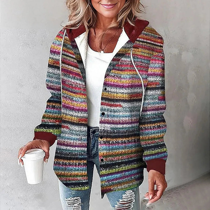 Woman wearing gray checkered lined cardigan paired with jeans for a casual look