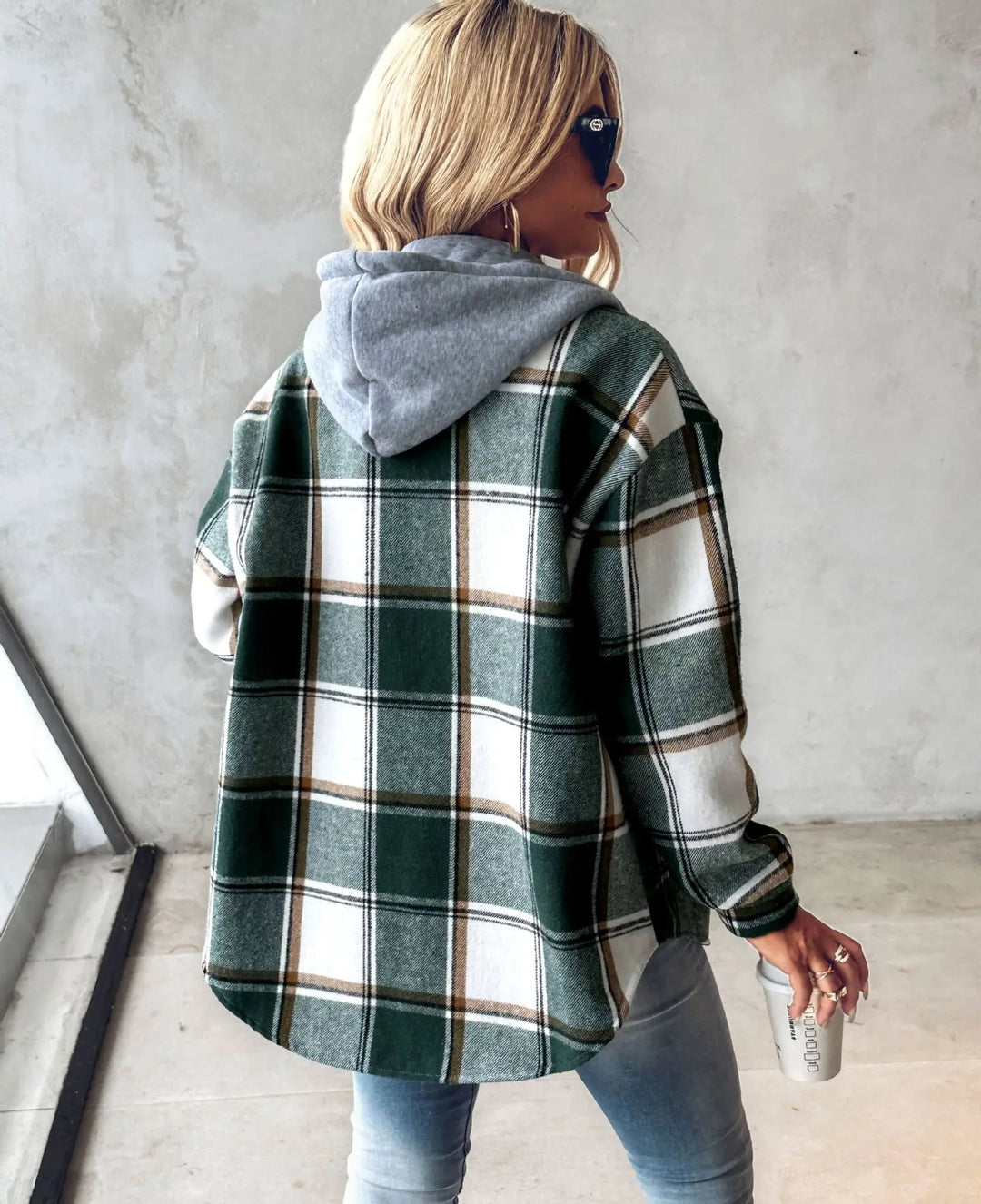 Back view of women's checkered lined cardigan showing drape and fit