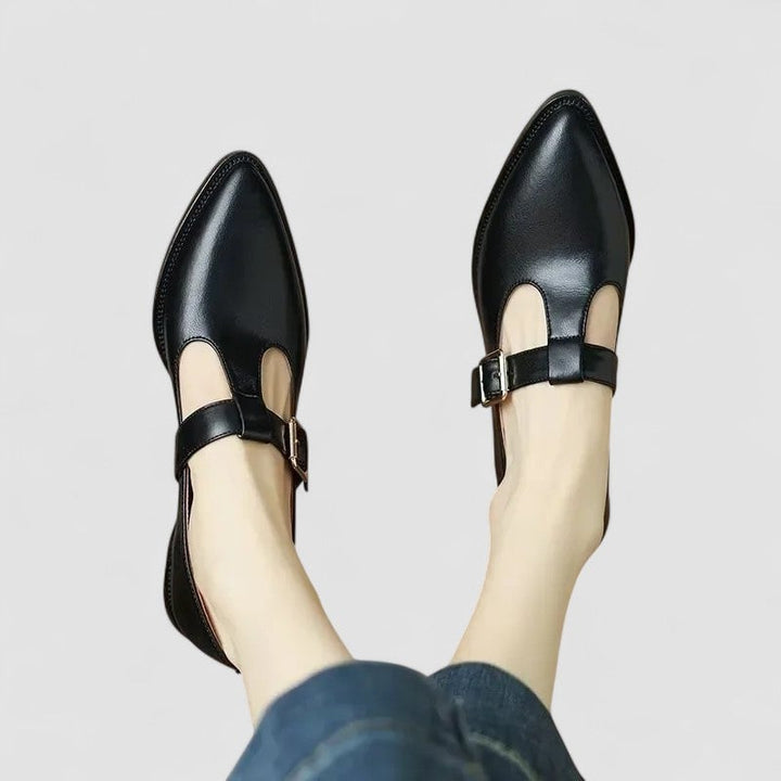 Carmen elegant shoes in beige colorway styled with tailored trousers for a polished daytime look