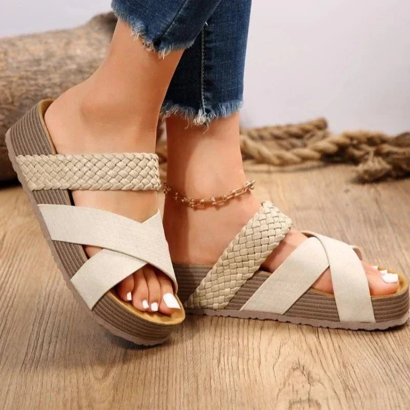 Side view of Carmen cushioned sandals showing lightweight sole and minimalist strap design