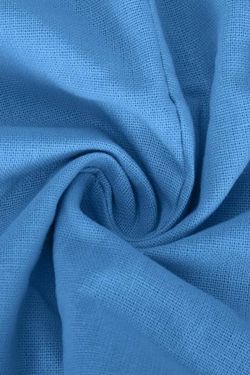 Back view of the Carmen navy blue straight-leg pants and batwing top set
